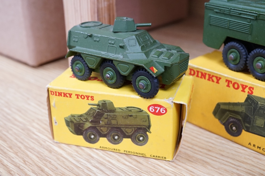 Nine boxed Dinky Toys military vehicles; Armoured Command Vehicle (677), Scout Car (673), Armoured Car (670), Army Water Tanker (643), Army 1-ton Cargo Truck (641), Armoured Personnel Carrier (676), Army Covered Wagon (6